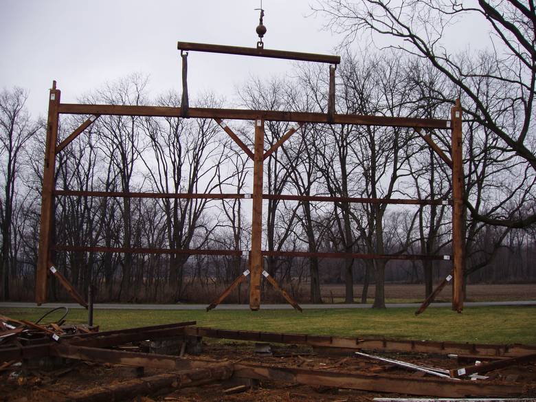 Camp Barn Frame Dismantle / A bent being flown to the dismantle area